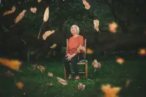 Woman Sitting on Chair While Looking Upwards