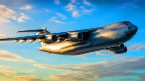 Illustration de l'avion militaire Lockheed C-5M Super Galaxy en plein vol. Image réalisée par IA.