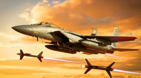 Illustration de l'intégration des roquettes guidées laser AGR-20F sur le chasseur F-15E pour cibler les drones.