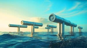 « Kinowave transforme les vagues en électricité propre » : une innovation française récompensée qui capte 65 % de l’énergie marine Illustration de la centrale Kinowave exploitant la puissance des vagues pour produire de l'électricité propre.